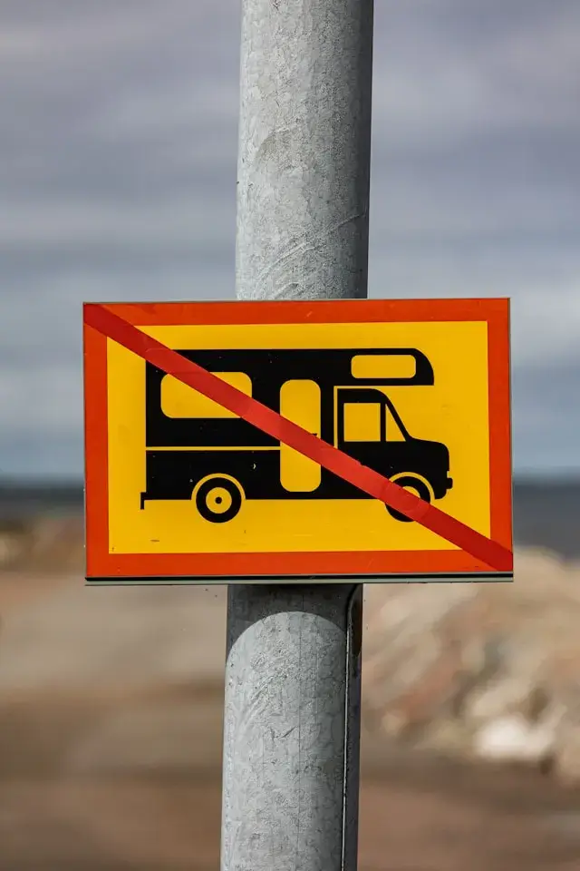A "No Camping/RVs" sign with