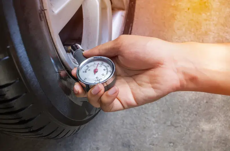 An RVer uses an old analog tire pressure monitoring system on their motorhome's wheels.