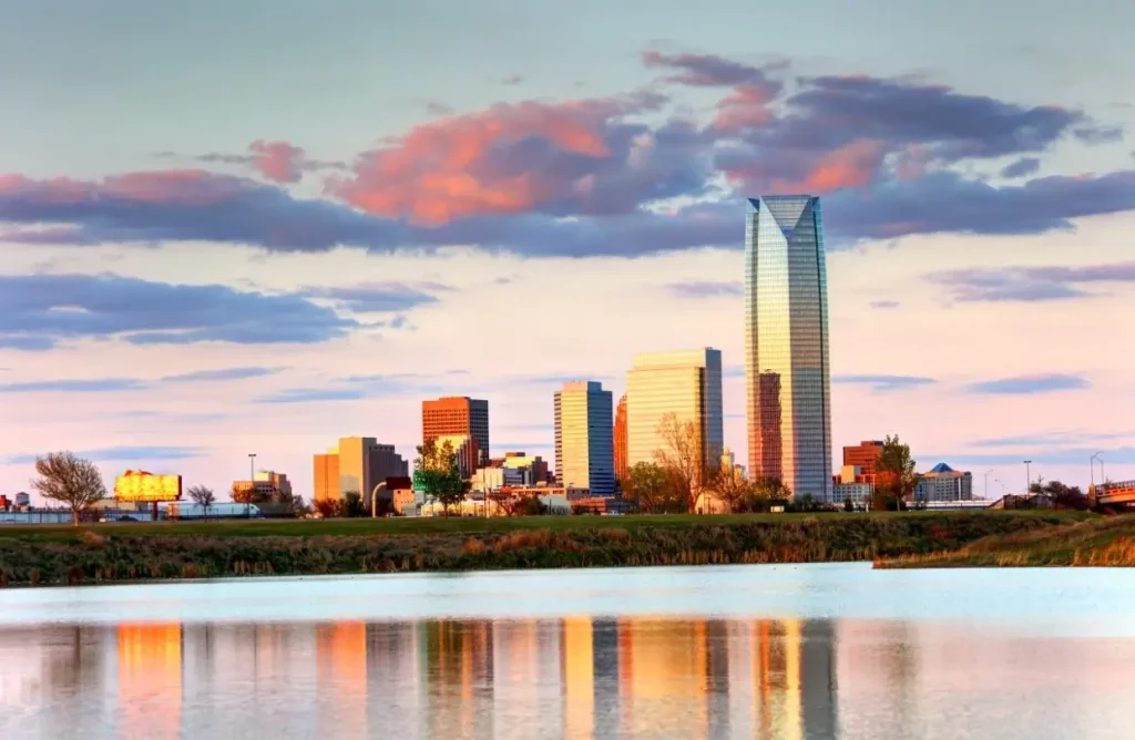 Oklahoma City, the capital of Oklahoma state, photgraphed from the water at sunrise.