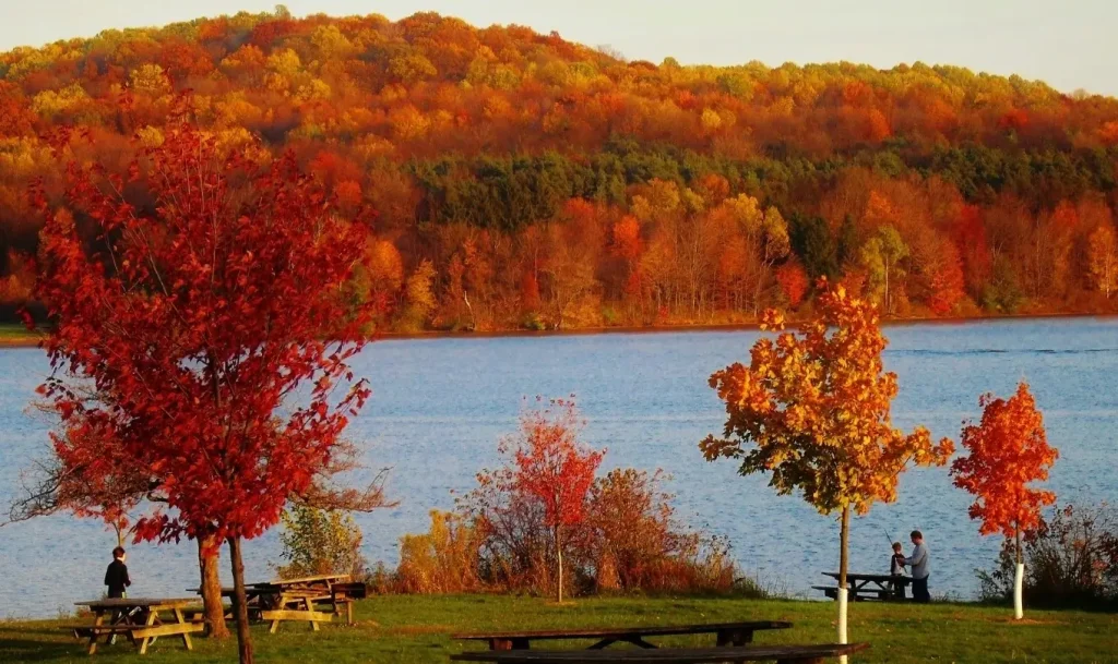 A pullover park for RVs in Pennsylvania by a beautful fall foliage scenic lake.