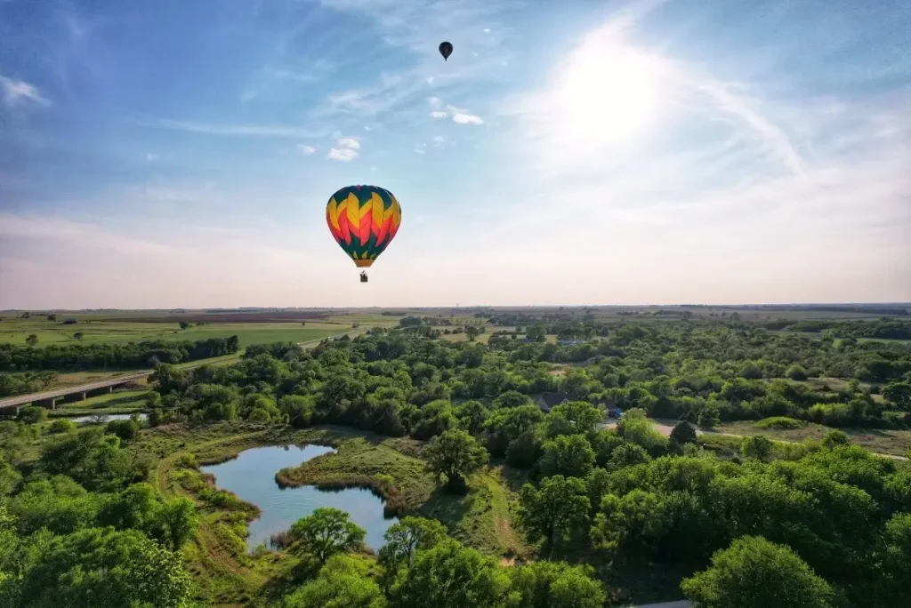 Hot air ballons soaring above Anthony, Kansas, at the Sunflower Balloon Festival.