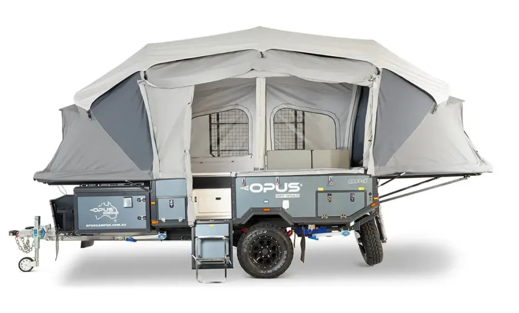 A product image of the Opus OP4 with its rounded inflatable shape and all-terrain tires, demonstrating why its the best pop-up camper for going off-grid.